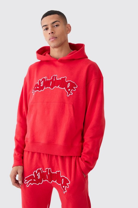 Kastiger Oversize Trainingsanzug mit Applikation und Reißverschluss