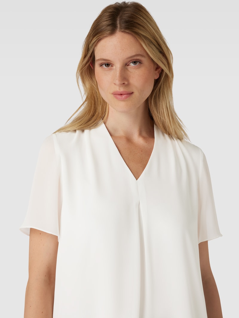 Bluse mit V-Ausschnitt in weiß
