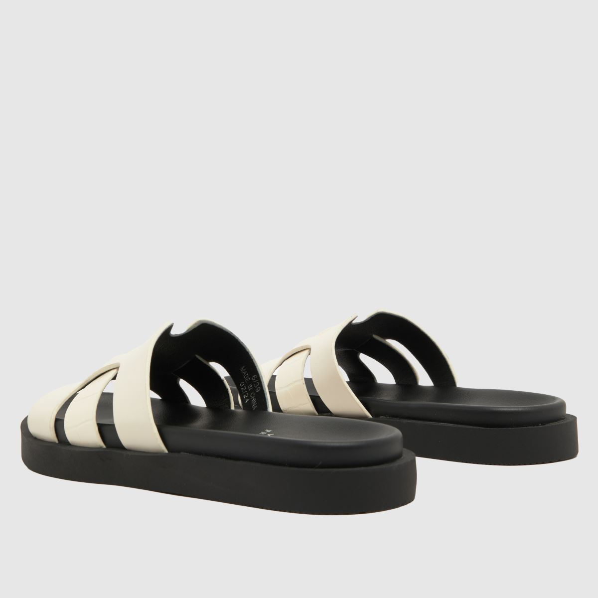 Schuh Timmy Crocs talpbetétes szandál törtfehér színben