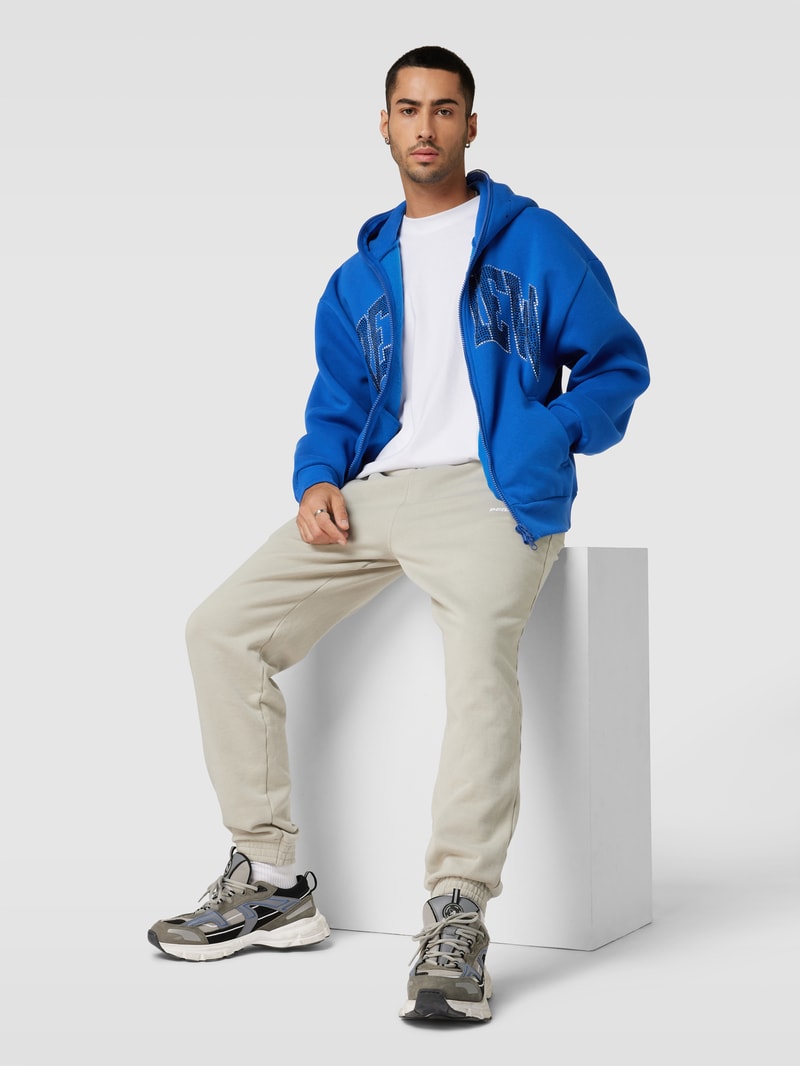 Oversized Sweatjacke mit Paillettenbesatz in royalblau
