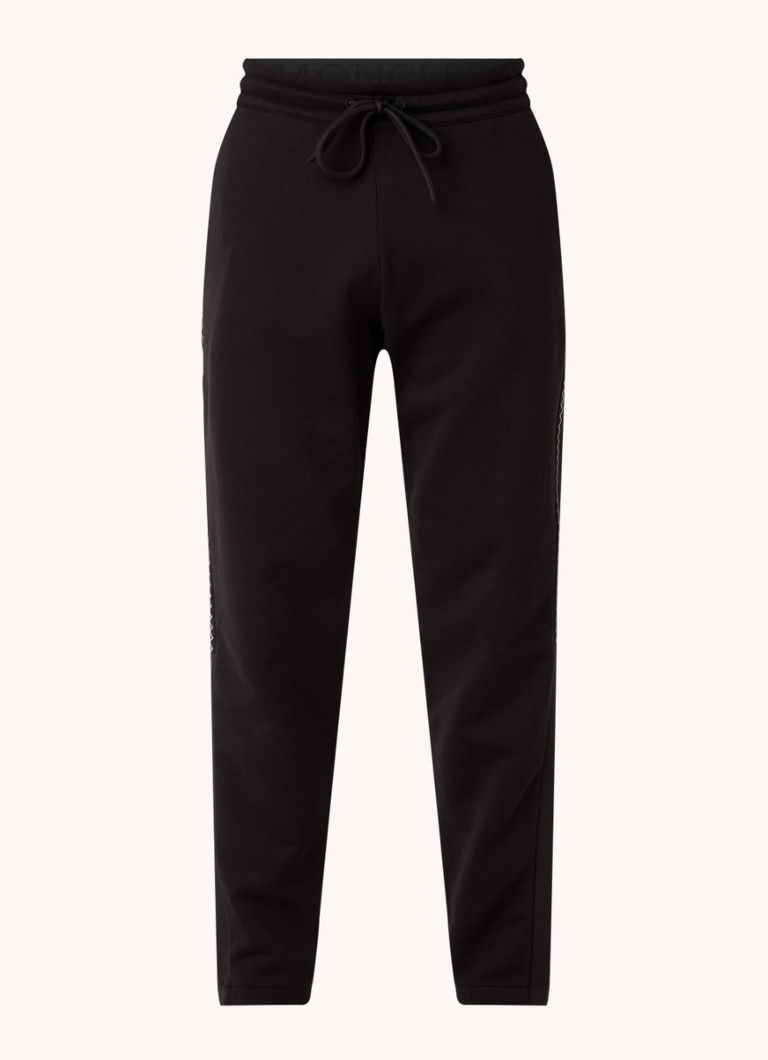 Pantaloni de trening Moncler slim fit cu imprimeu
