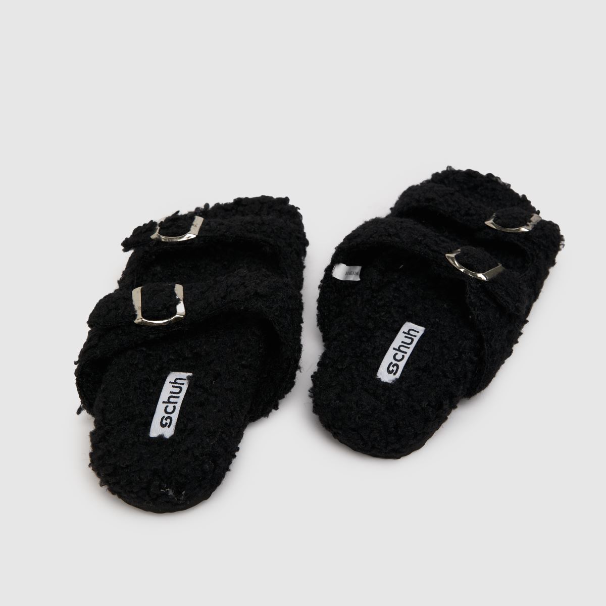 Schuh Haven – Svarta tofflor med borgspänne