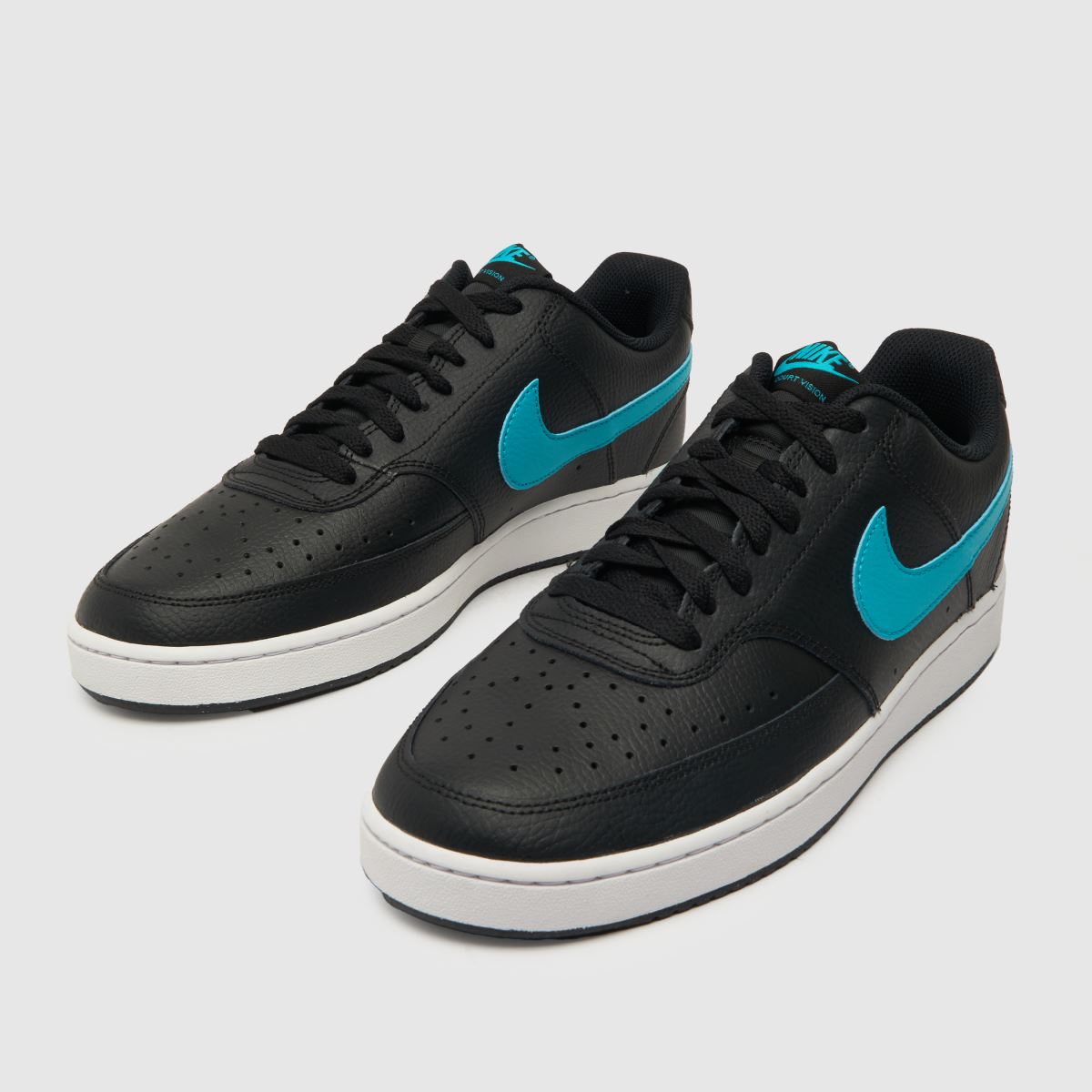 Športni copati Nike Court Vision v črni in modri barvi