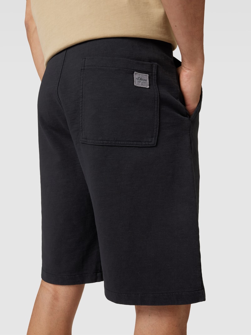 Sweatshorts mit Tunnelzug Modell 'Washer' in schwarz