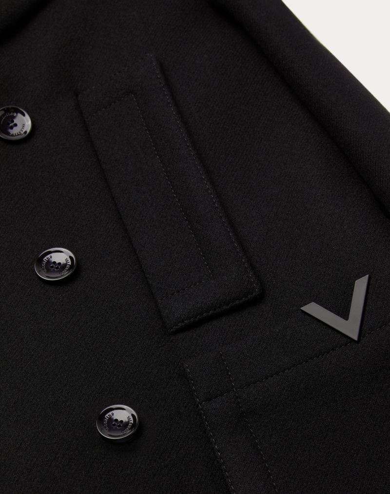 PEACOAT I TEKNISK ULDSTOF MED GUMMI V-DETALJER