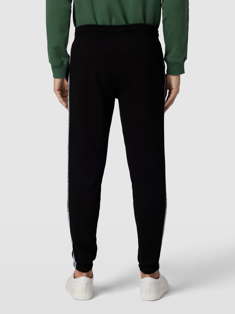 Sweatpants mit Label-Streifen Modell 'TAPE' in schwarz