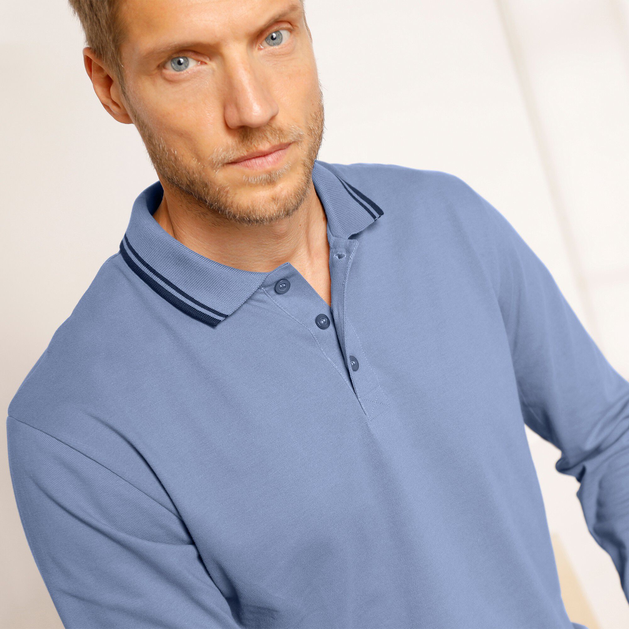 Polo uni maille piquée manches longues