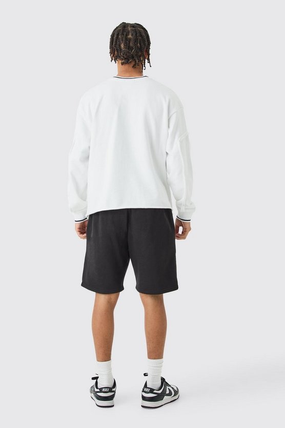 Lockere Shorts mit Official-Applique
