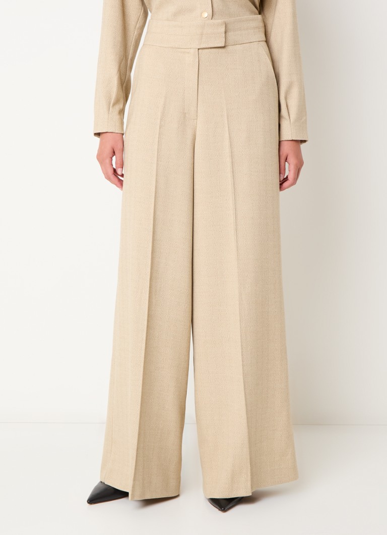 Pantaloni cu talie înaltă, cu croială largă și cute călcate, de la Aaiko Nore.