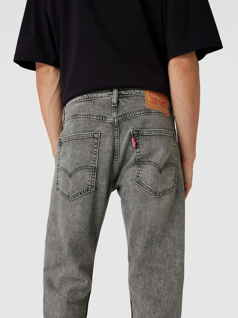 Tapered Fit Jeans Modell '502 TAPER' in hellgrau