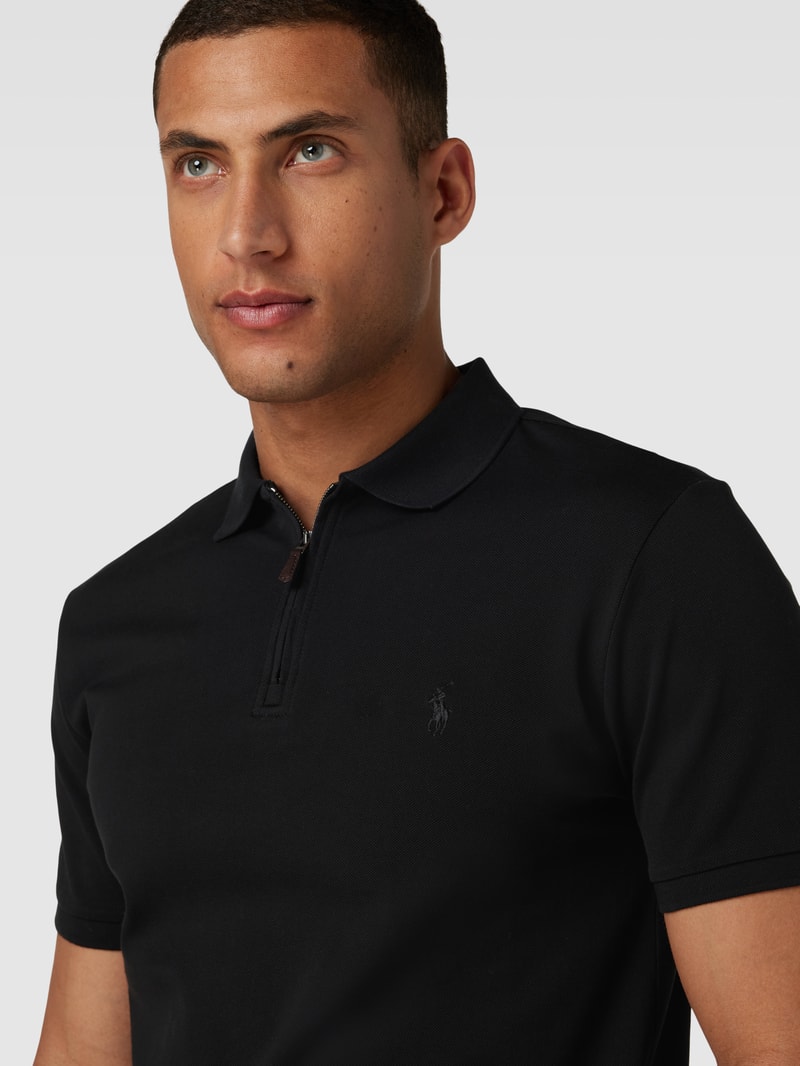 Poloshirt mit kurzem Reißverschluss in schwarz
