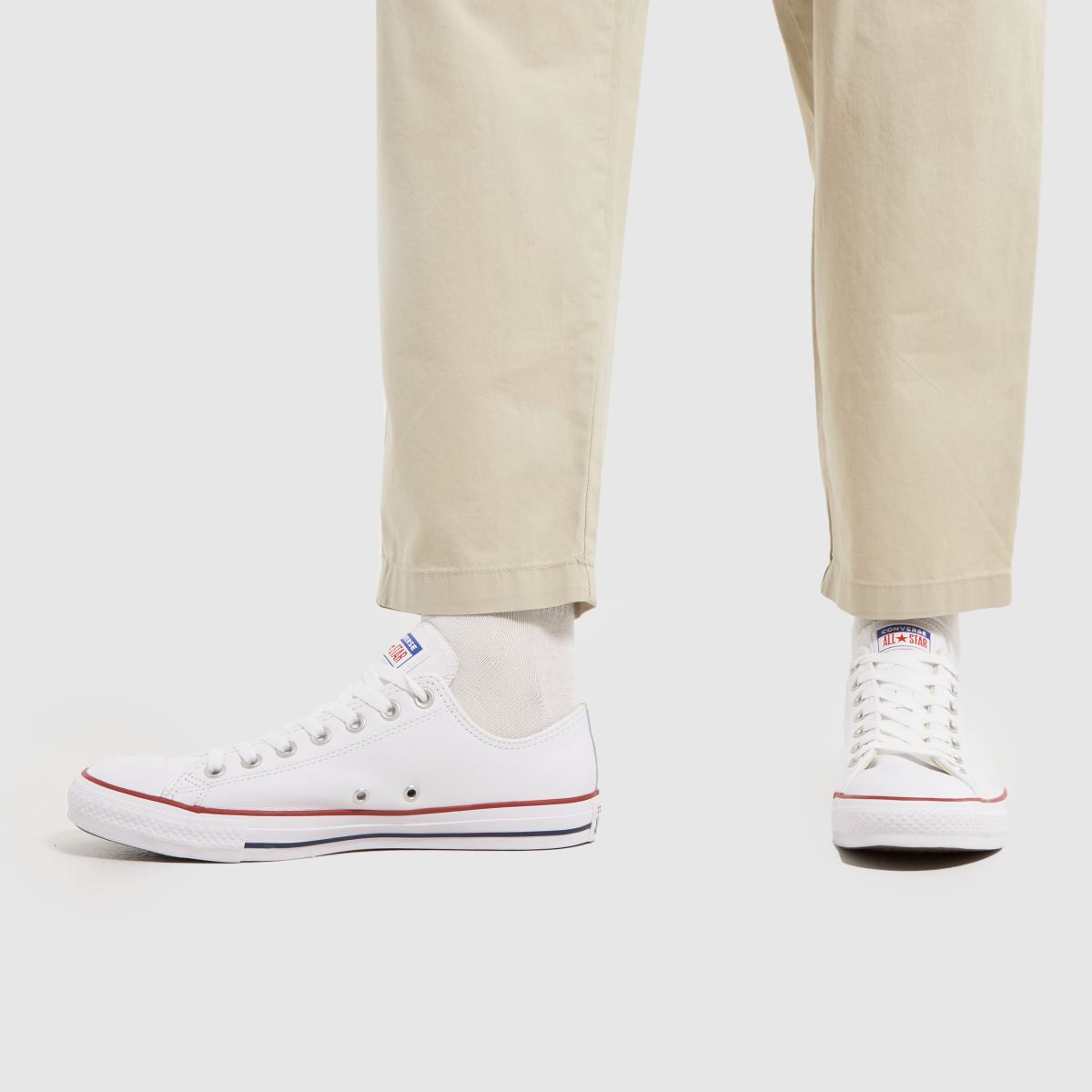 Converse – All Star – Vita sneakers med oxmönster