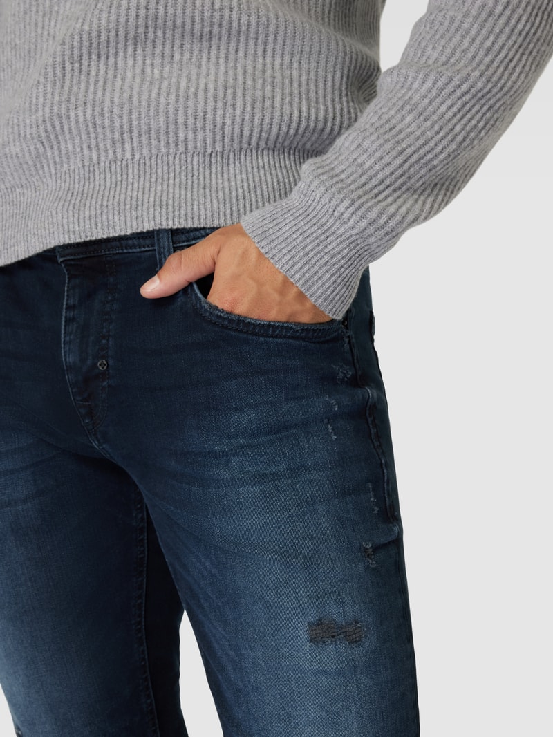 Tapered Fit Jeans im Destroyed-Look in hellblau