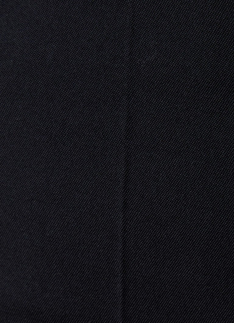 Spodnie Balmain z wysokim stanem i rozszerzanymi nogawkami, wykonane z dziewiczej wełny i ozdobione wyraźnym kantem.