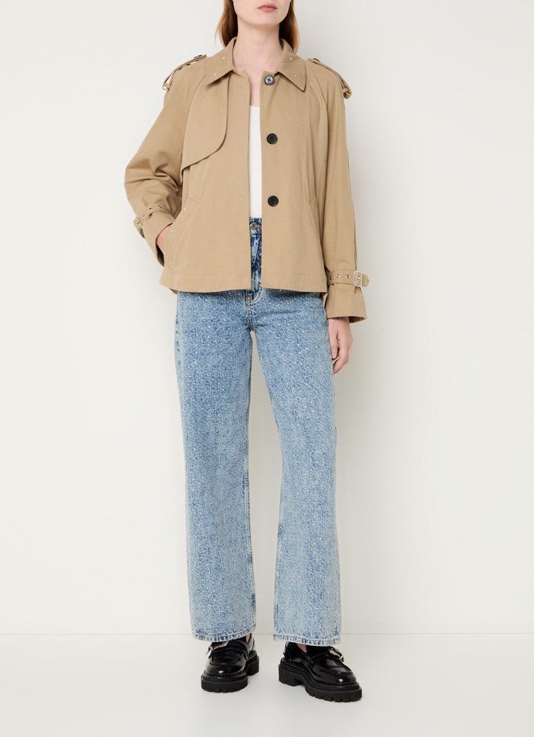 Gabardina corta Maje con cintura anudada y borlas.