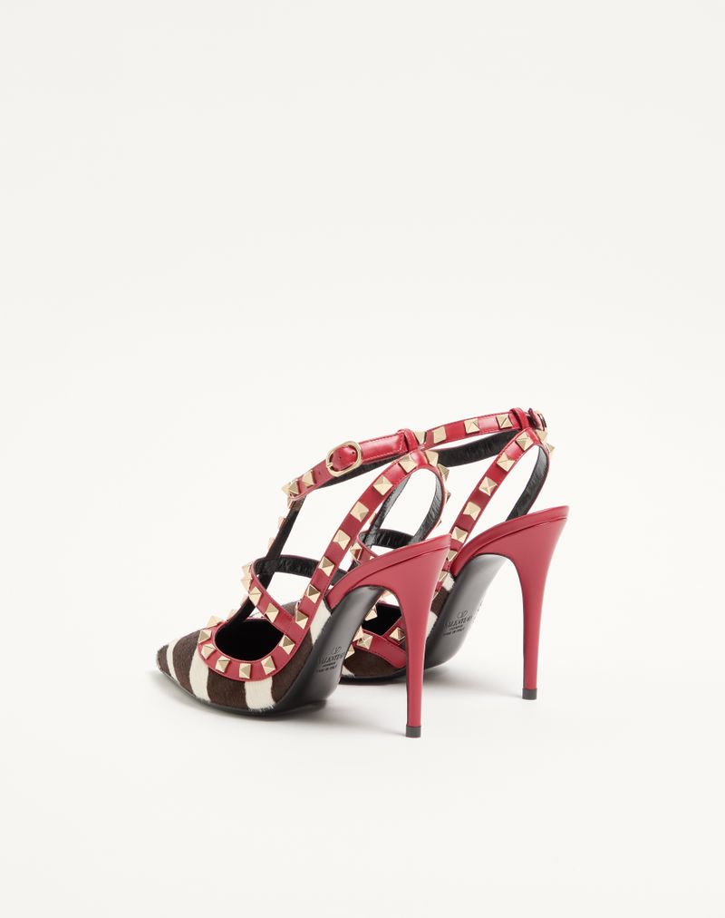 Rockstud pumps i 100 mm kalveskind med hesteskindseffekt