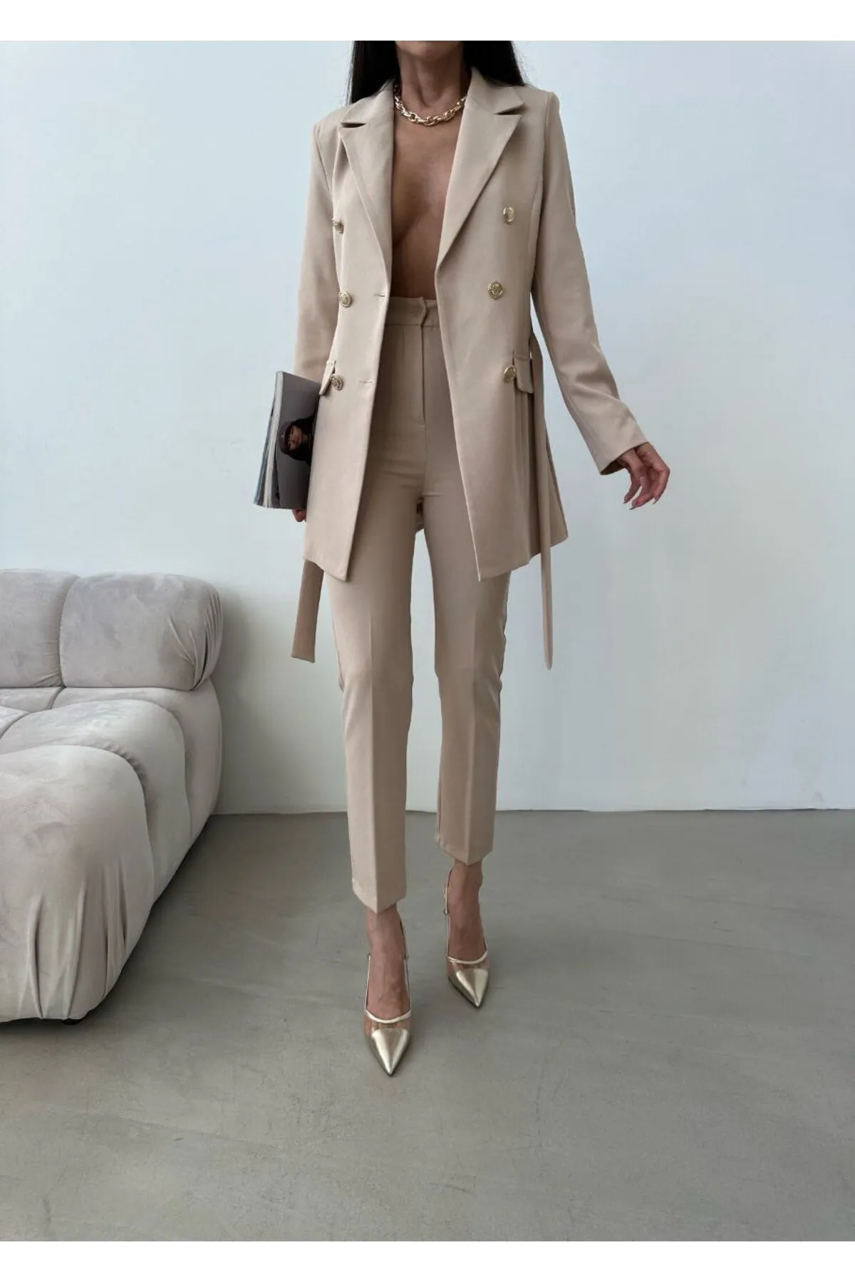 SONREİR  Knopfdetail zum Binden von Jacke und Hose