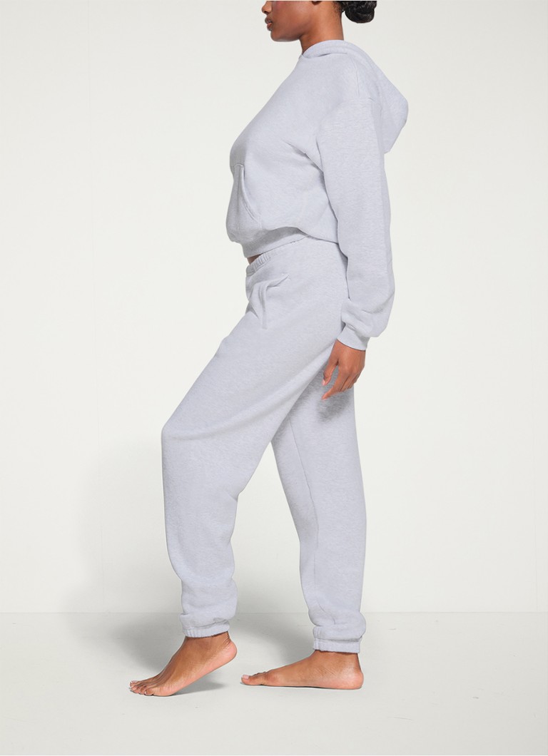 SKIMS  Cotton Fleece mid waist tapered fit loungebroek met steekzakken