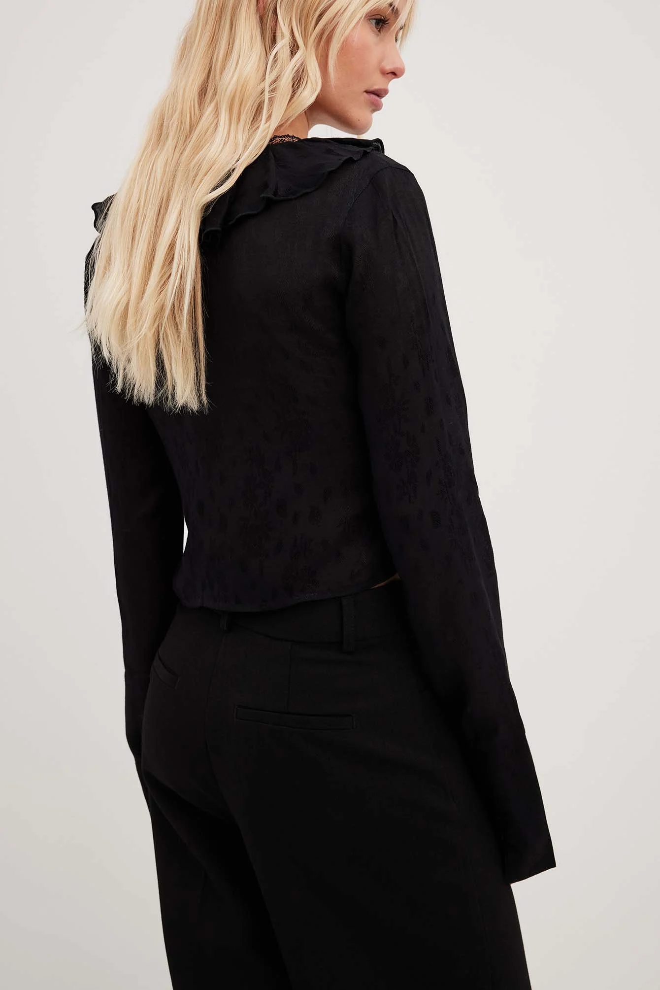 Spitzendetail-Top