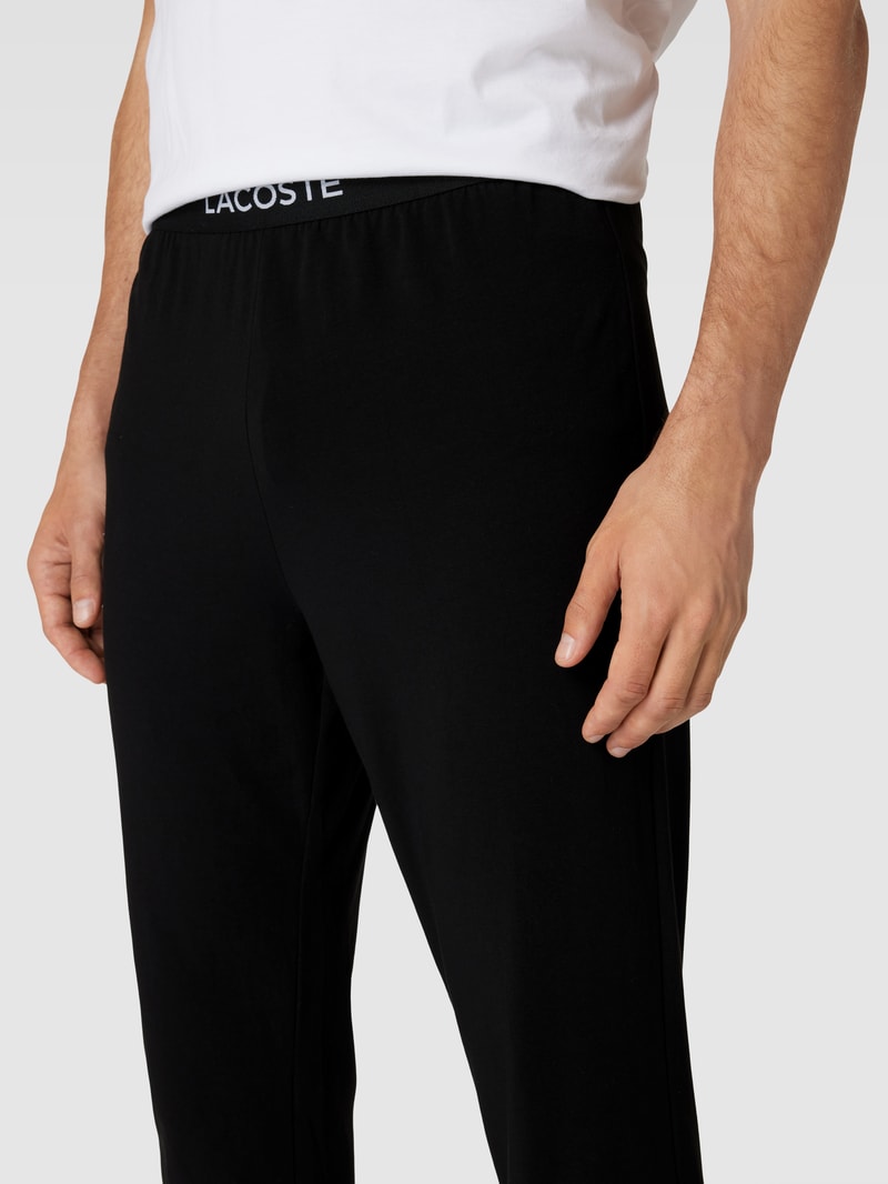 Pyjama-Hose mit elastischem Logo-Bund in schwarz