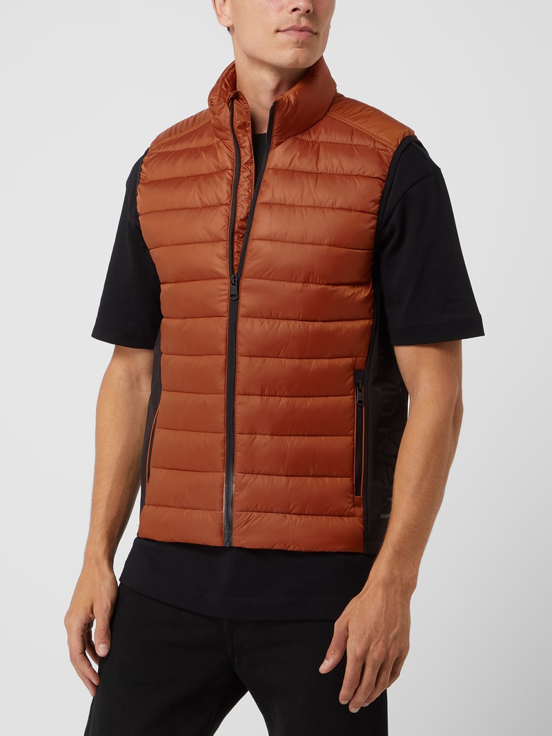 Light-Steppweste mit Stehkragen in dunkel orange