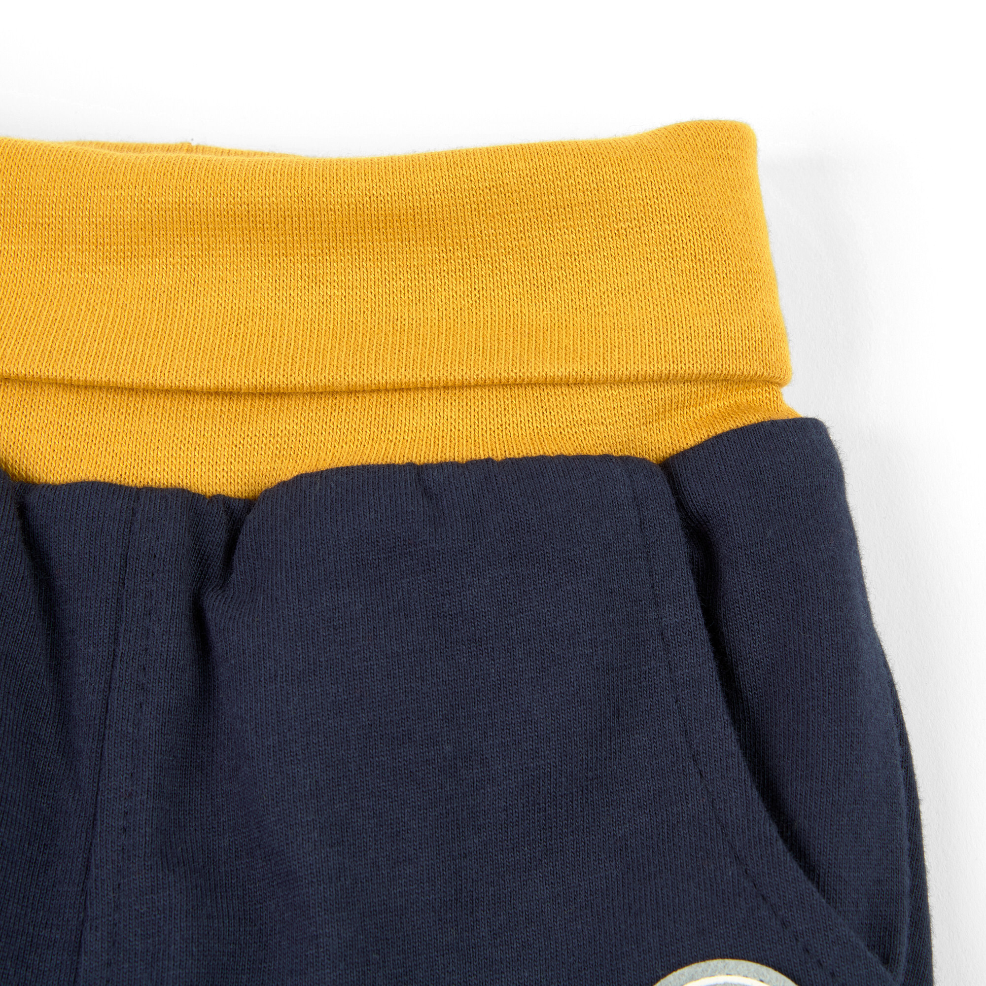 Baby Wendehose, gelb mit Blumen oder dunkelblau