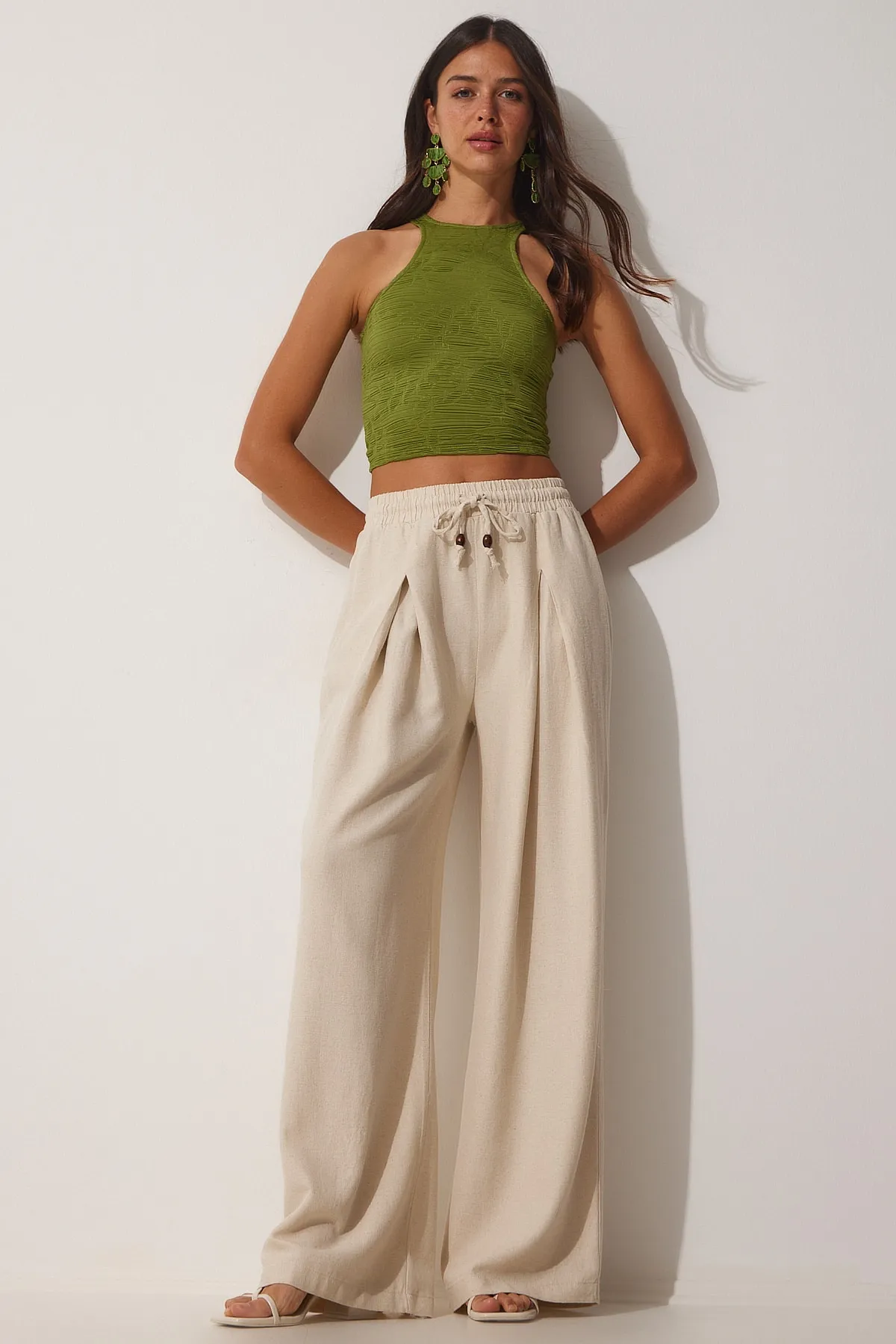 Happiness İstanbul  Cremefarbene lockere Palazzo-Hose aus Rohleinen für Damen NS00388