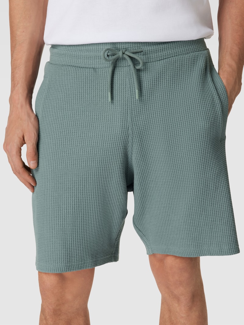 Shorts mit Strukturmuster in petrol