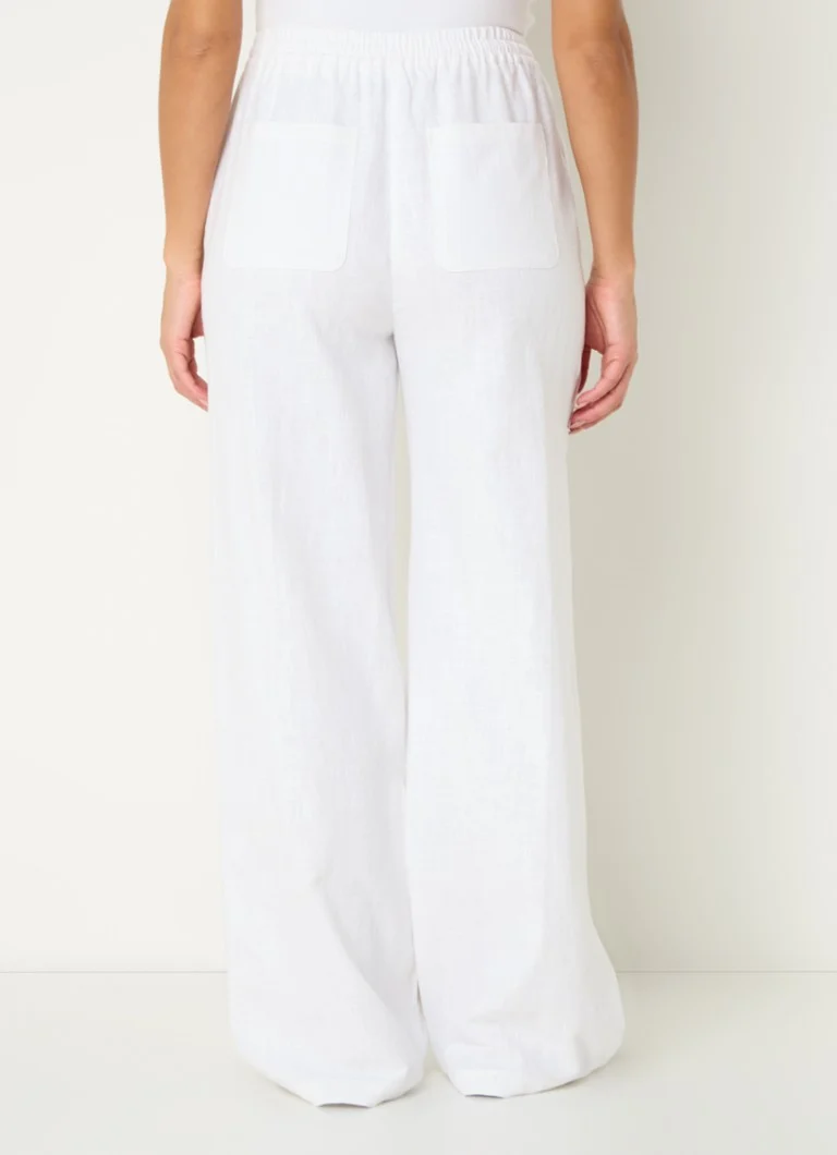 Pantaloni palazzo a vita alta e gamba larga modello Loise di Co'Couture, in lino