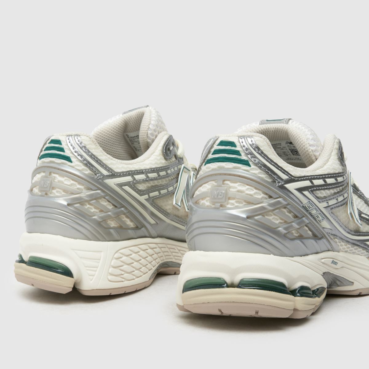 New Balance 1906r träningsskor i vitt och silver