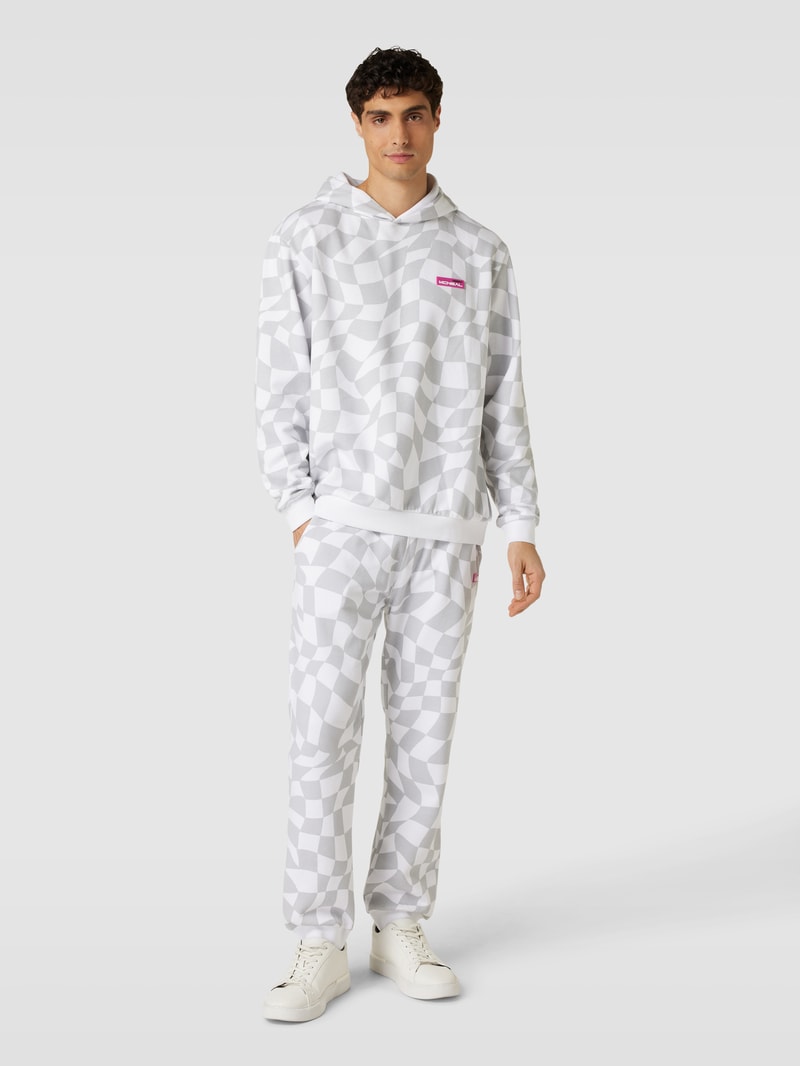 Sweatpants mit Label-Patch in weiß