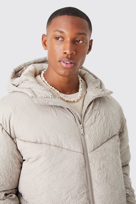 Strukturierte Steppjacke in Knitteroptik mit Kapuze