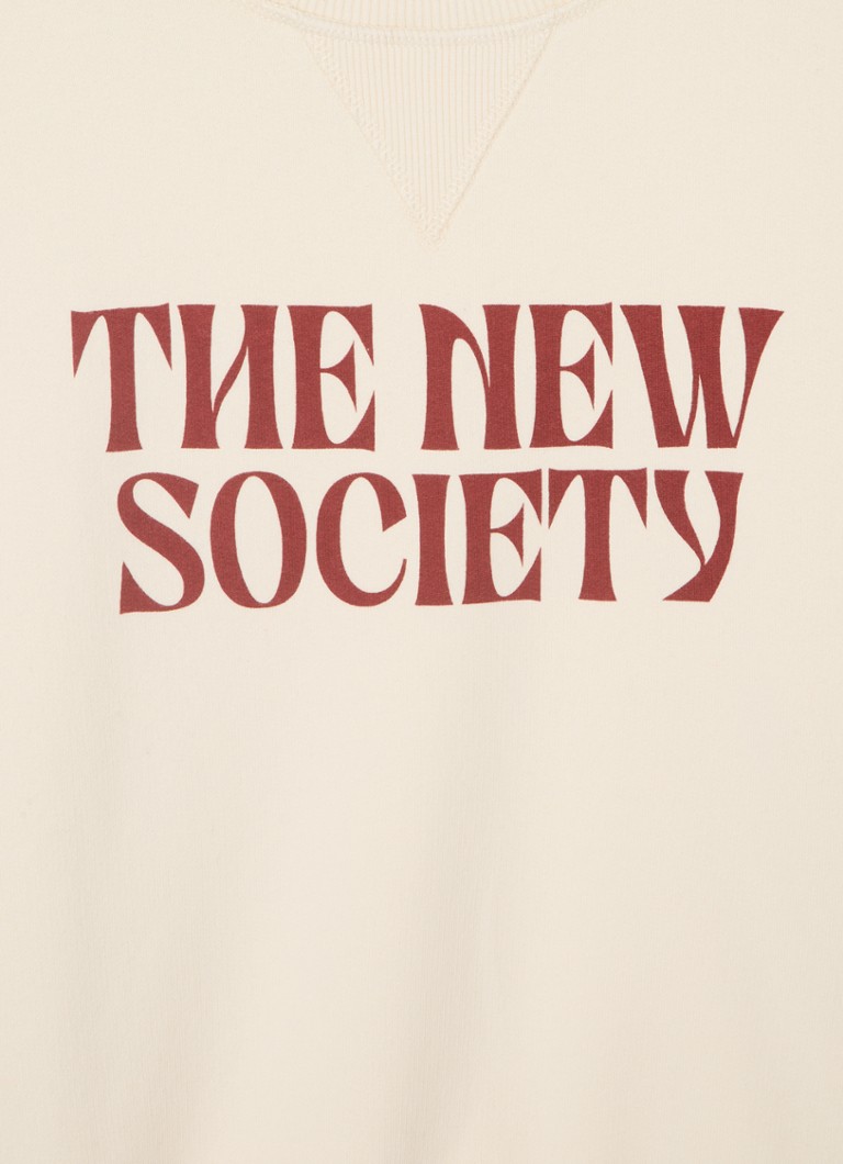 „The New Society“ megztinis su logotipo spauda