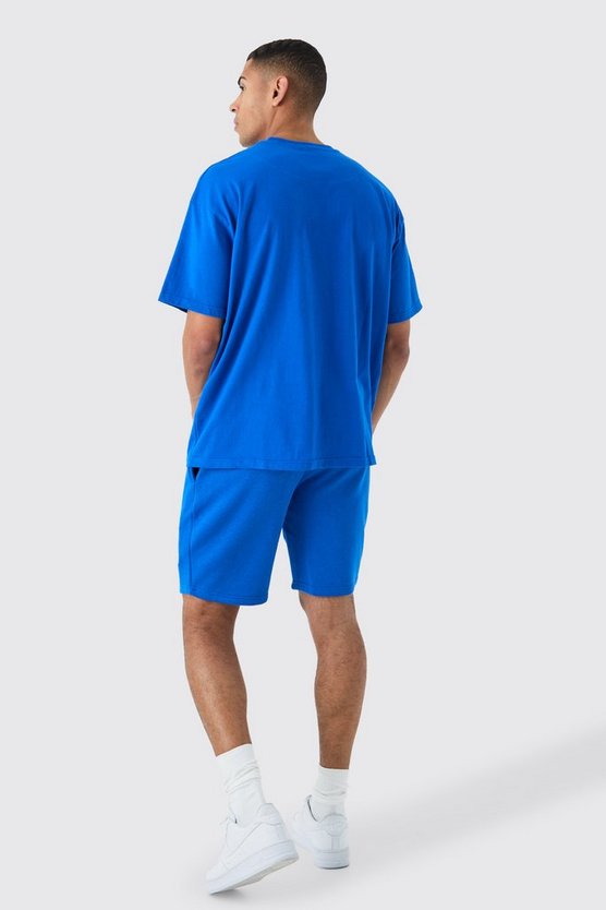 Lockere mittellange Shorts mit Applikation