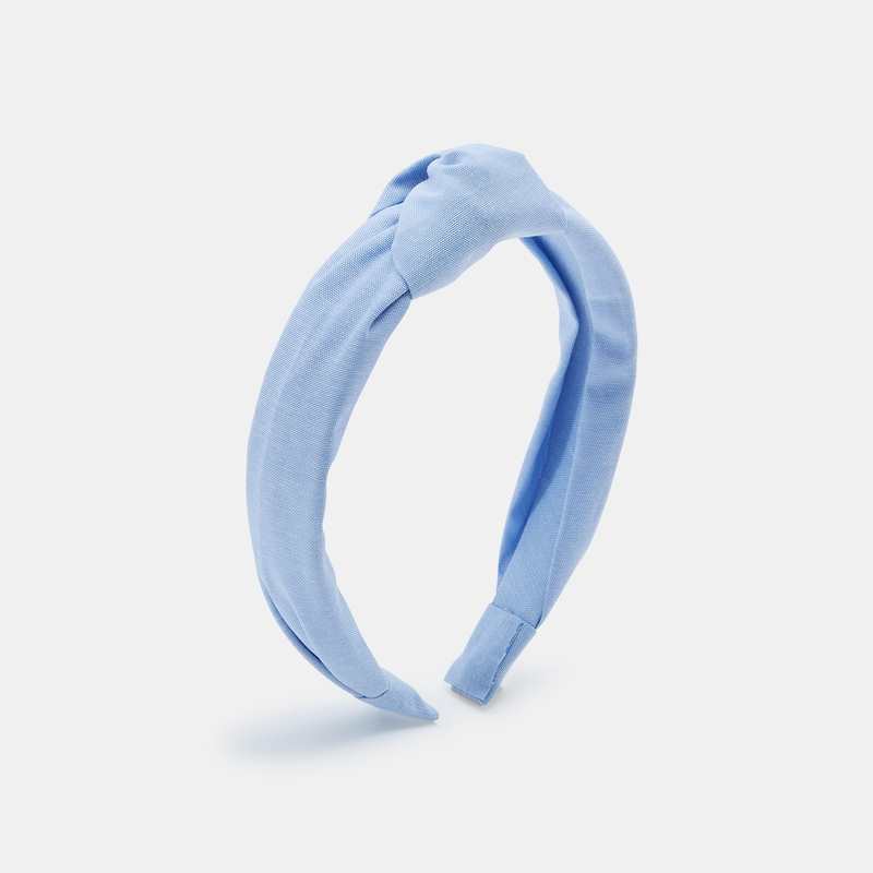 Serre-tête uni à effet noué bleu fille