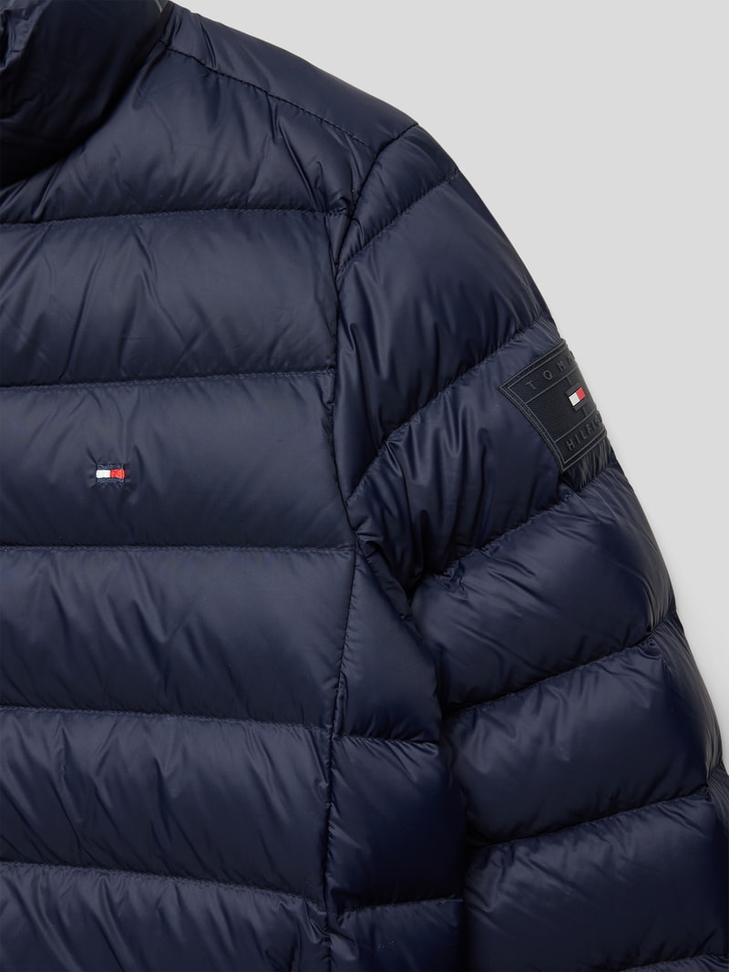 Daunenjacke mit Stehkragen in marineblau