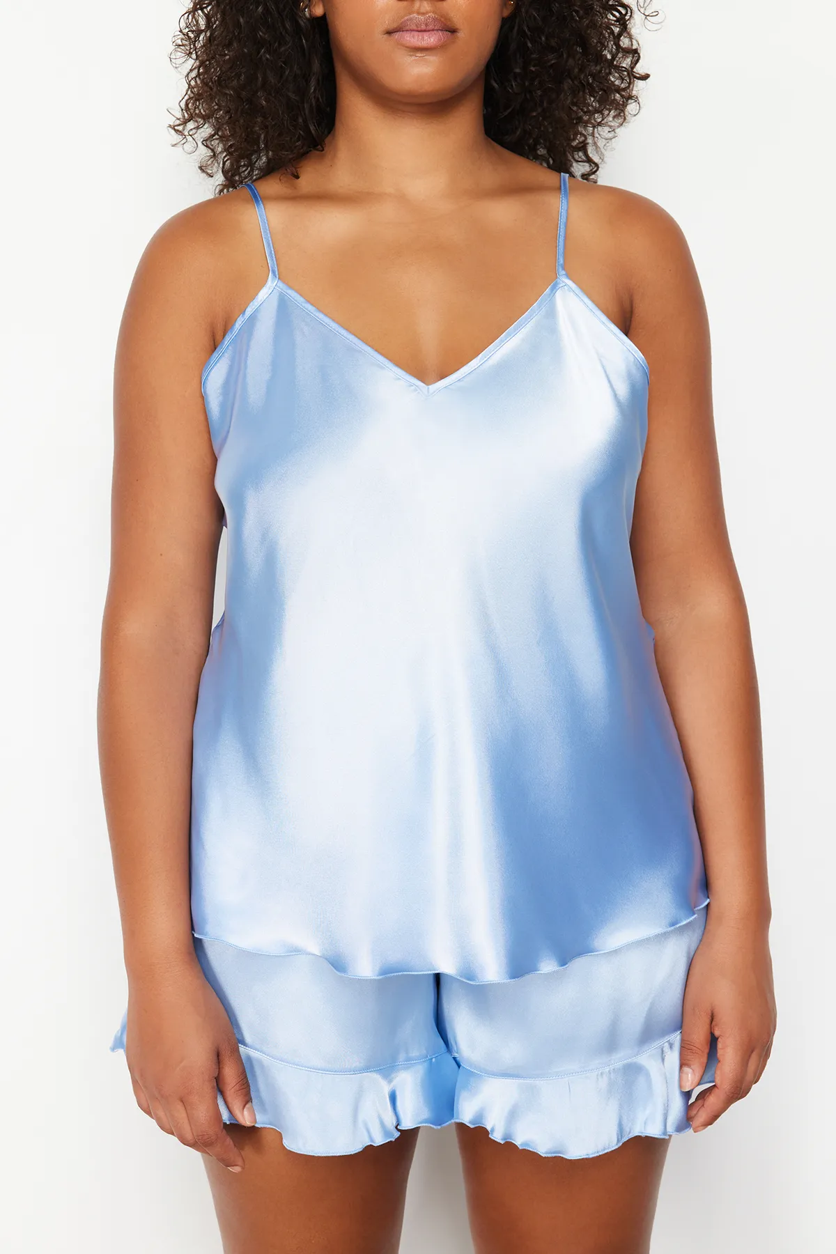 Trendyol Curve  Blaues Pyjama-Set aus gewebtem Satin TBBSS24AI00002