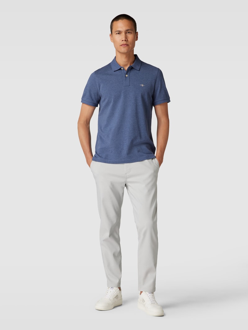 Poloshirt mit seitlichen Schlitzen Modell 'SHIELD' in jeans meliert
