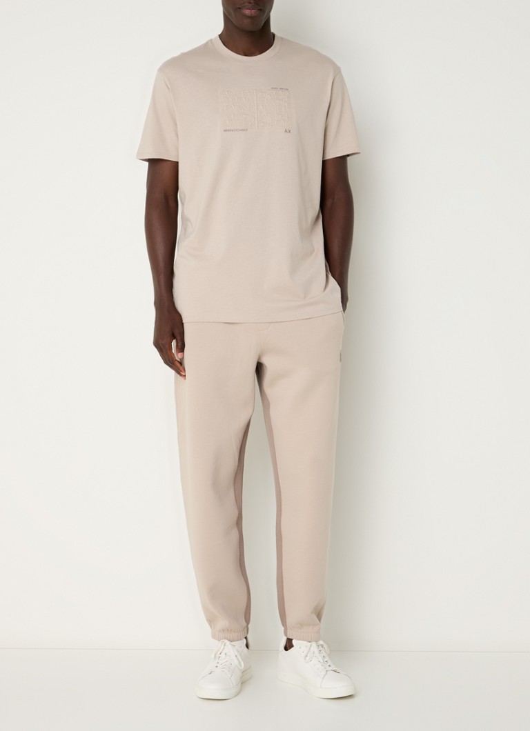 Pantaloni de trening slim fit de la Armani Exchange, cu logo și buzunare laterale.