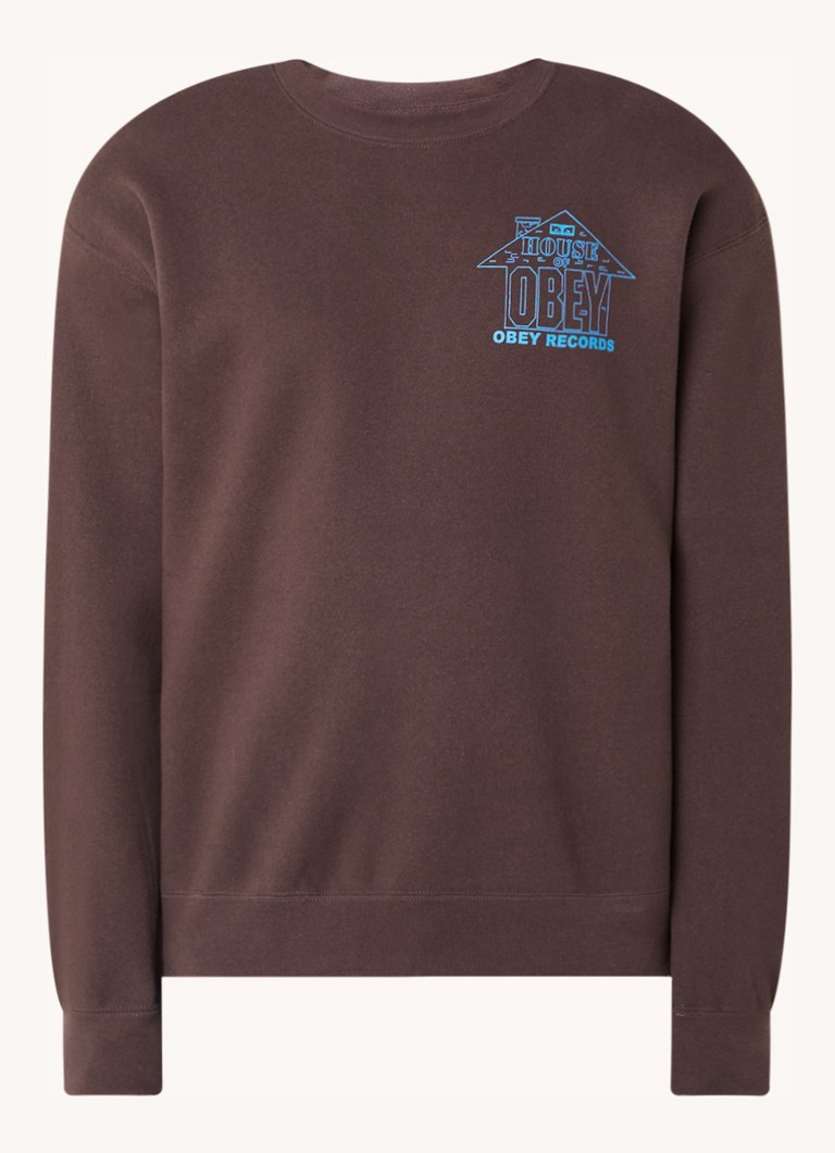 Džemper Obey House Of Obey Records s logotipom i printom na leđima