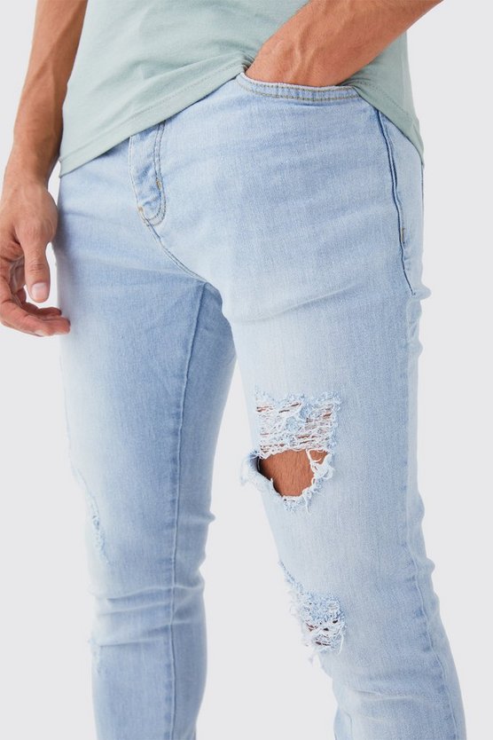 Herren Skinny Stretch Jeans mit Rissen