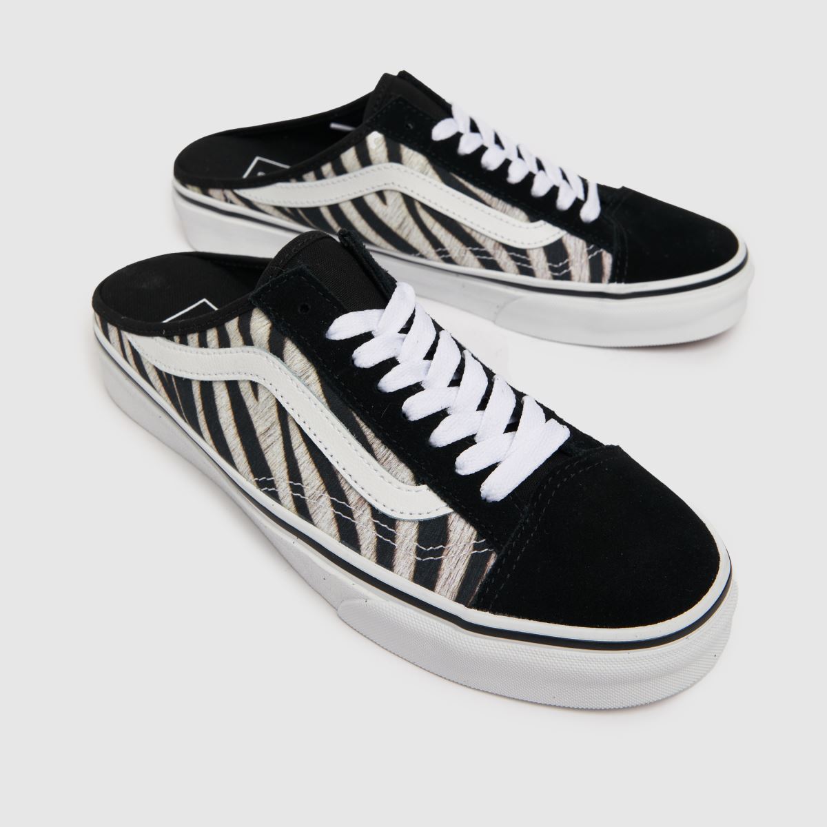 Vans UA Style 23 mule-sneakers i vitt och svart