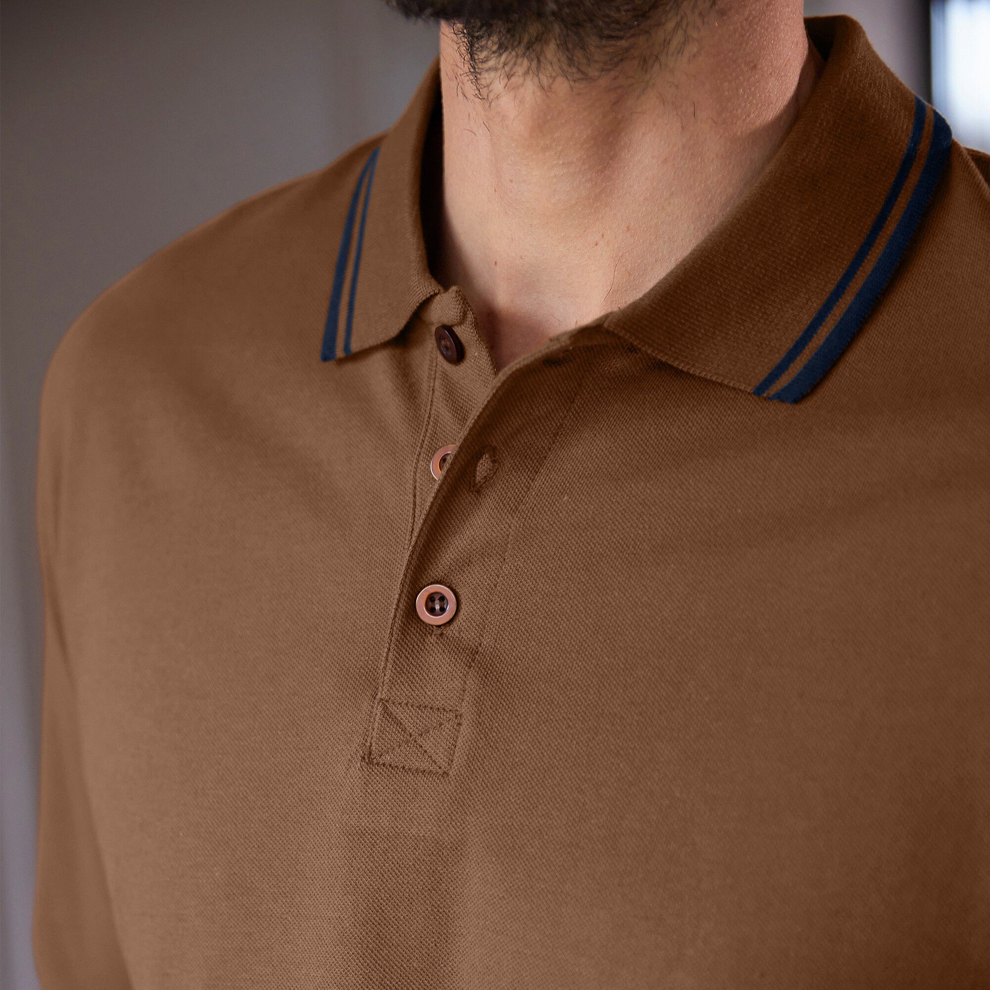 Polo uni maille piquée manches longues