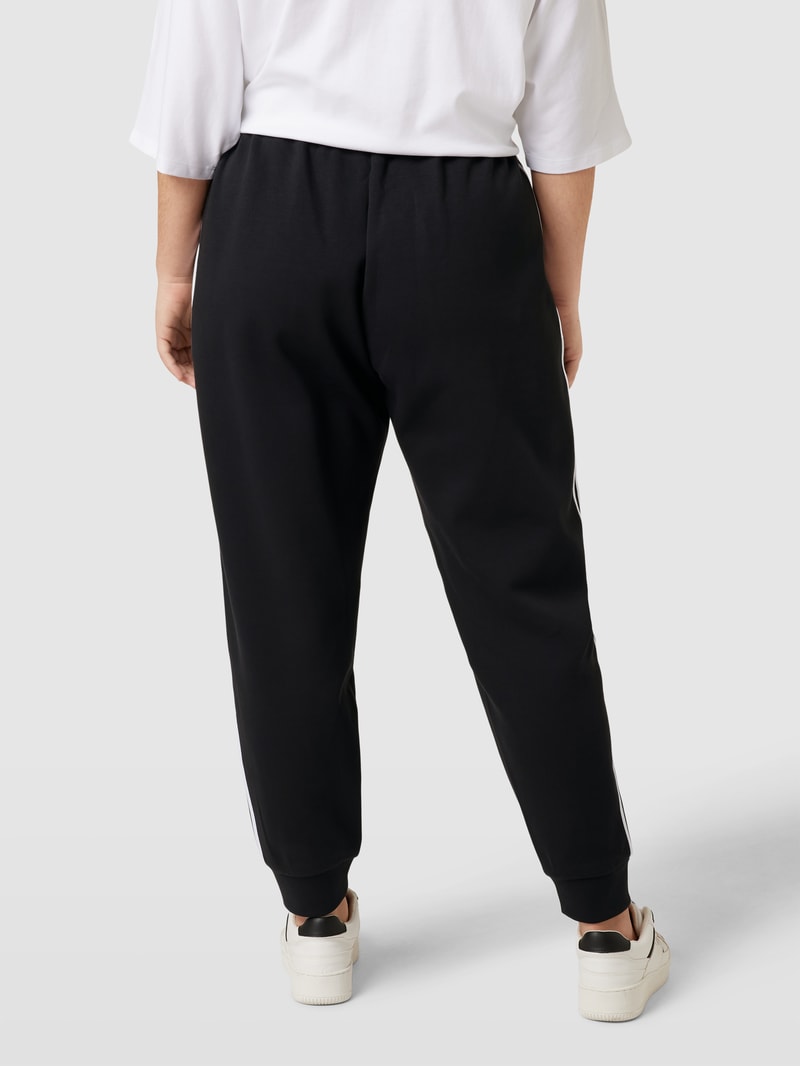 PLUS SIZE Sweatpants mit Kontraststreifen in schwarz