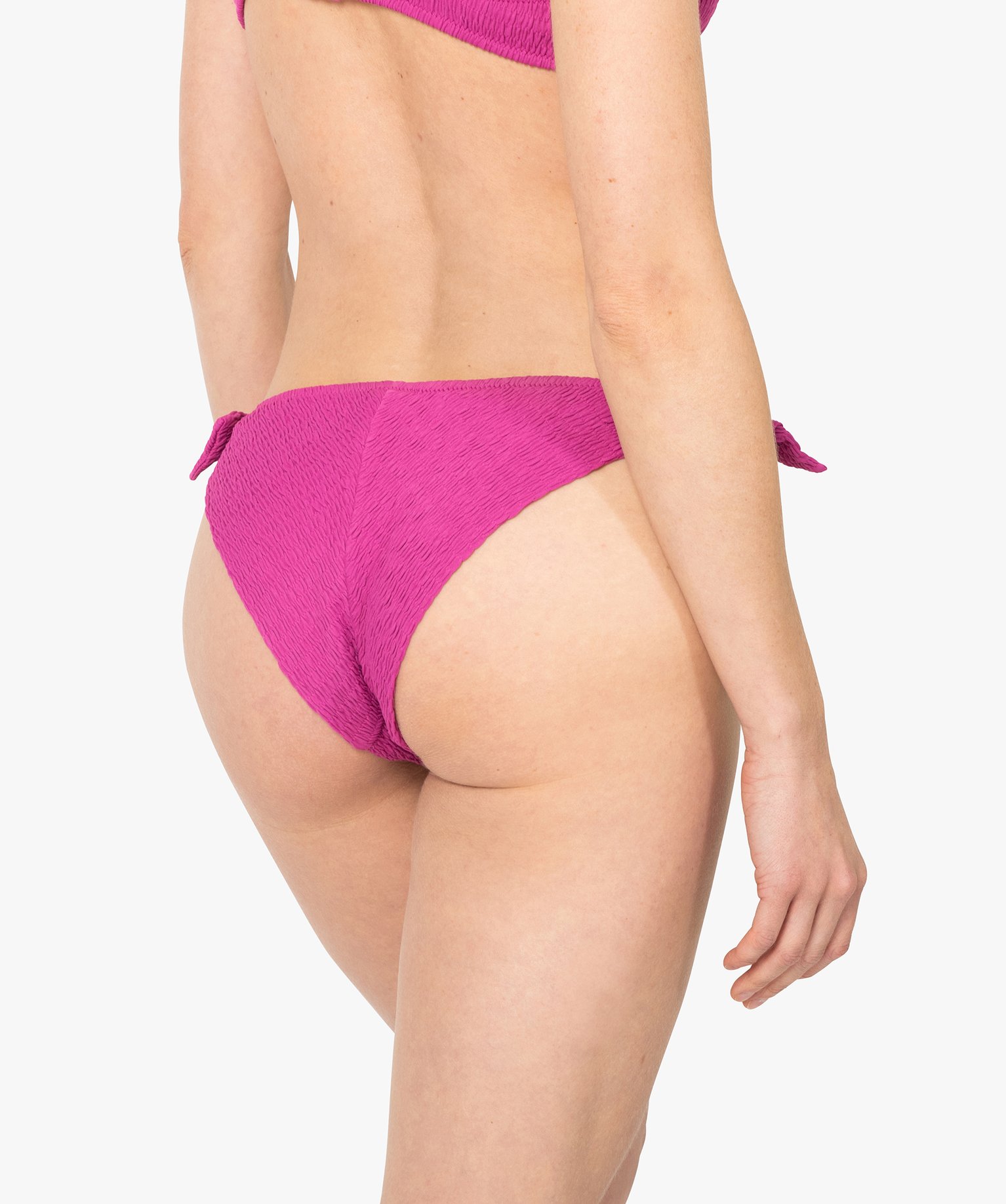 Bas de maillot de bain femme forme tanga en maille gaufrée rose | GEMO