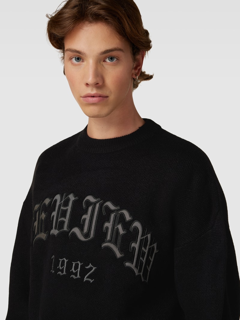 Strickpullover mit Label-Stitching in schwarz