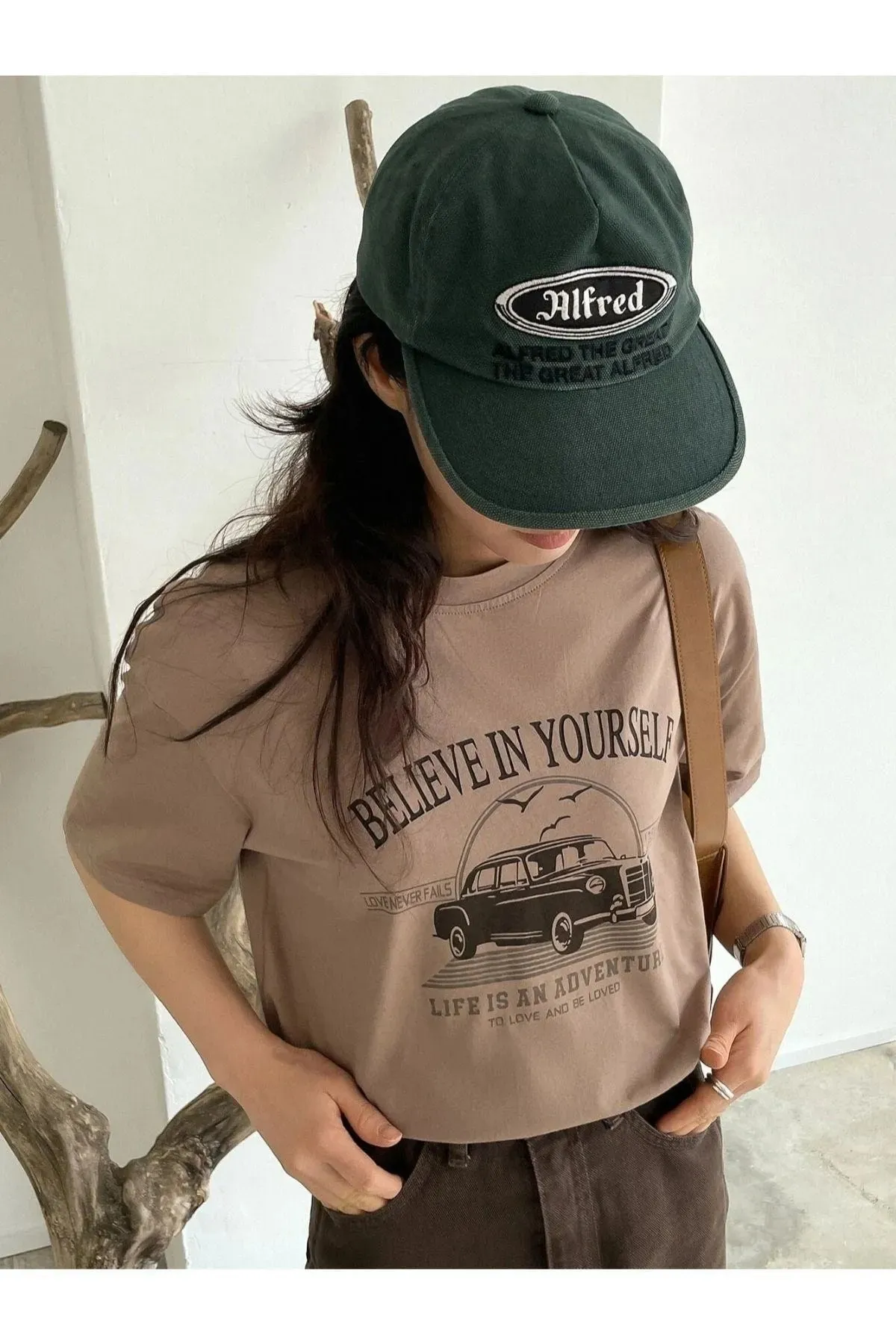 Know  Braunes, bedrucktes Oversize-T-Shirt „Believe In Yourself“ für Damen