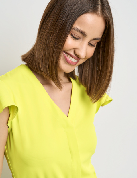 Fließender Jumpsuit mit Bindegürtel