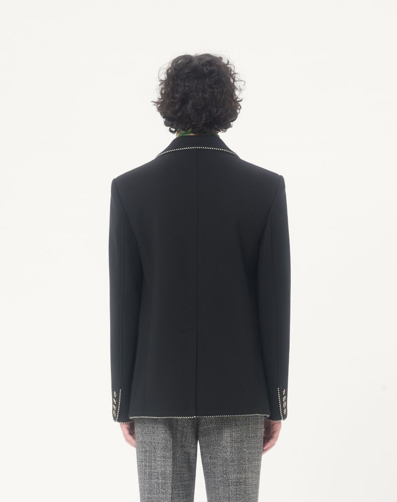 Valentino wollen jas met enkele rij knopen en Valentino-patch
