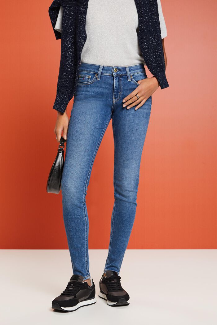 Skinny Jeans mit mittelhohem Bund und Ziersteinen